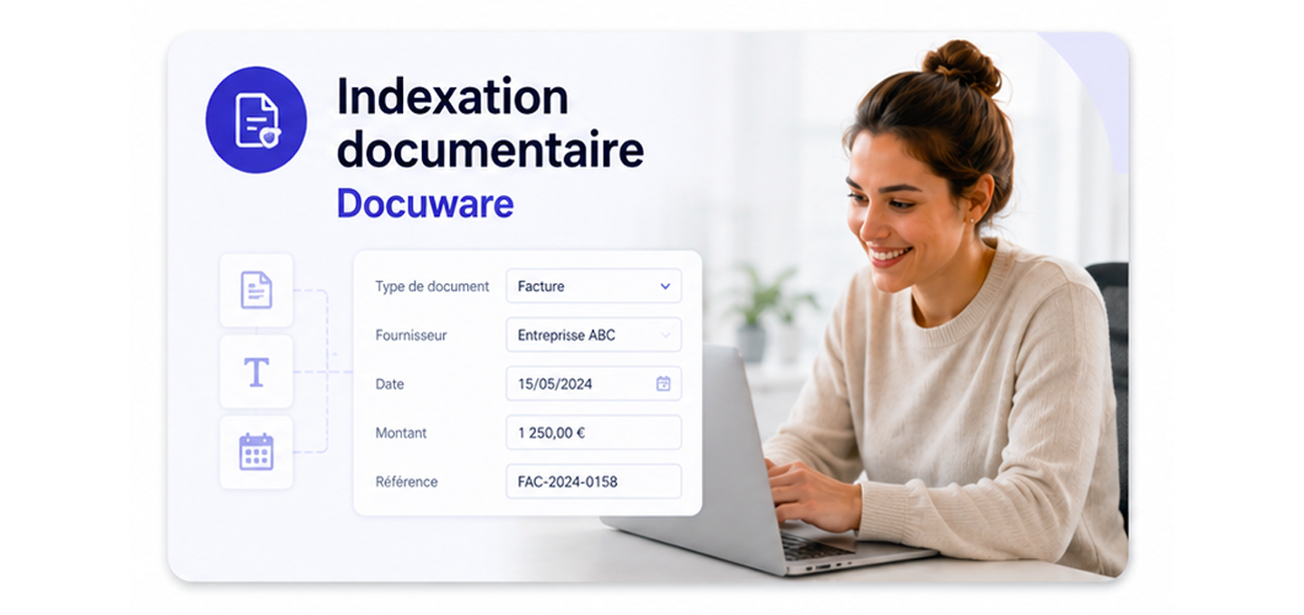 Three people sit around a table in an office, smiling and engaged with a computer displaying a document indexing program. The mood is collaborative.
